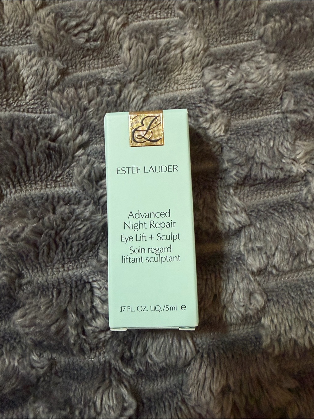 Estee Lauder Advanced Night Repair Eye Lift + Sculpt in pale mint with gold logo